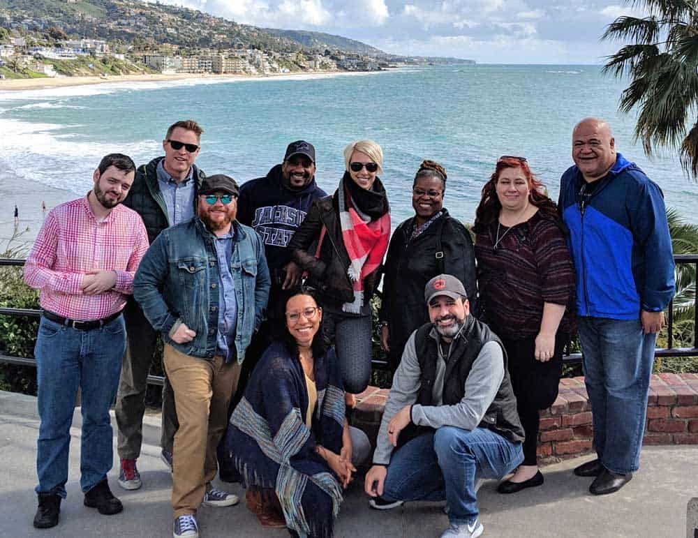 NBA-Chaplains-Peer-Group_webcrop Group of people posing in tropical setting