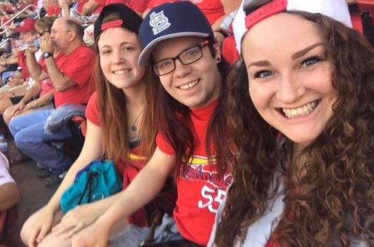 St. Louis Residents Ashlyn, Nathan, and Paige at a Cardinals game