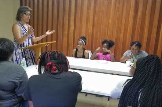 Gina Pearson, Street Law Facilitator, engages youth on the topic of curfews: Why do we have them?